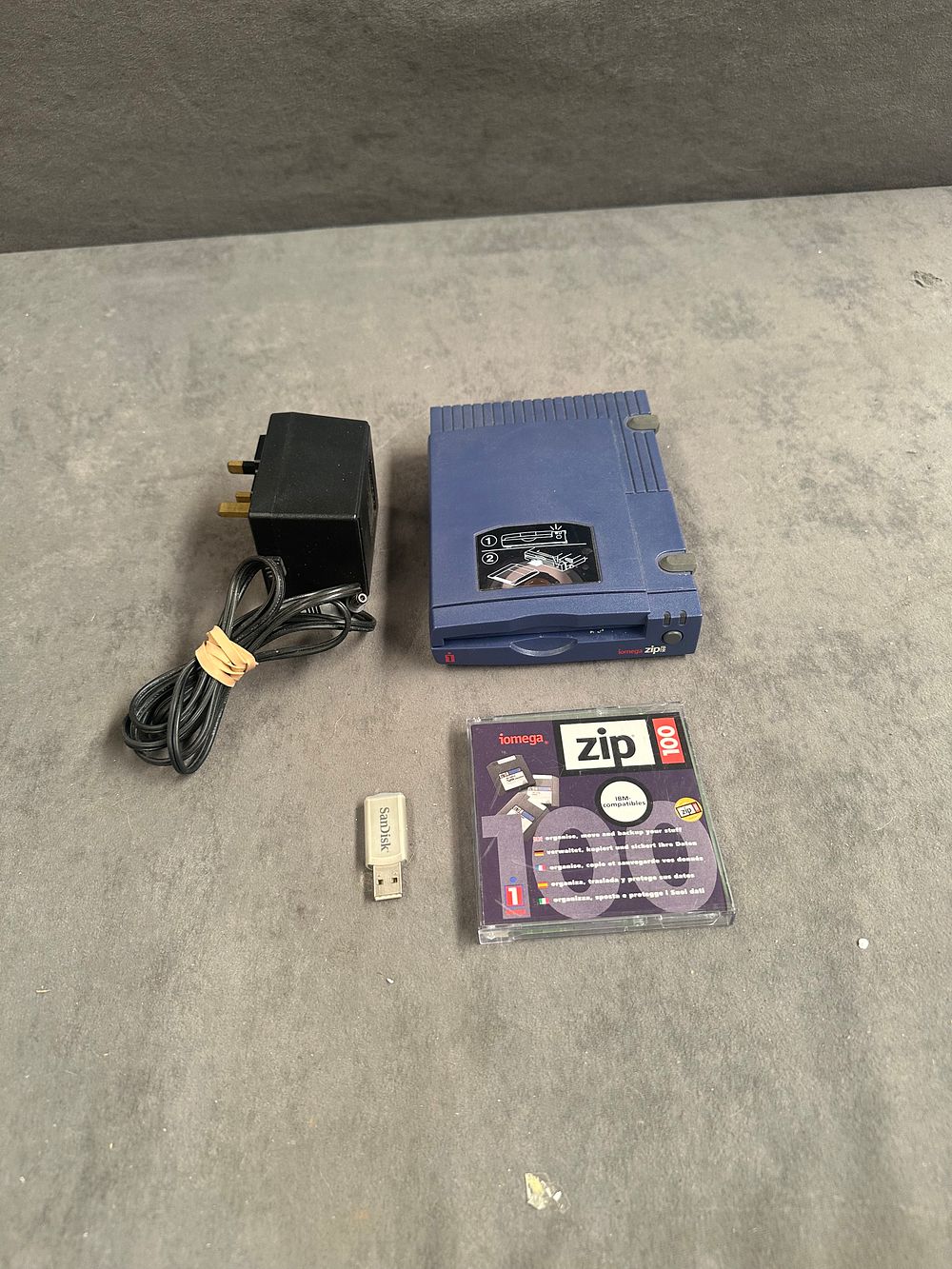 Lot 155: An Assortment of Vintage Computer Peripherals and Data Storage Media including an Iomega Zip 100 Drive