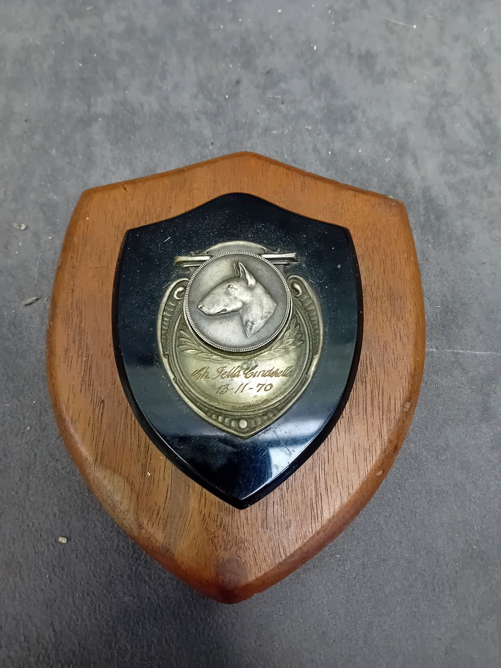 Lot 156: Commemorative Wooden Shield Plaque with Bull Terrier Medallion, Ch. Fella Cinderella, 1970