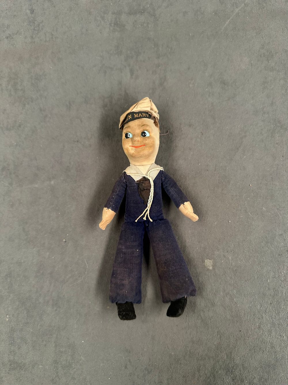 Lot 1: A Vintage Queen Mary Souvenir Cloth Sailor Doll