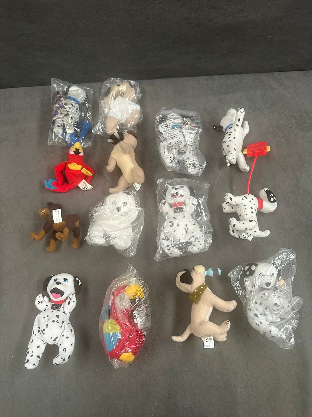 Lot 195: A Collection of 11 Disney 101 Dalmatians and Character Promotional Plush Toys by McDonald's