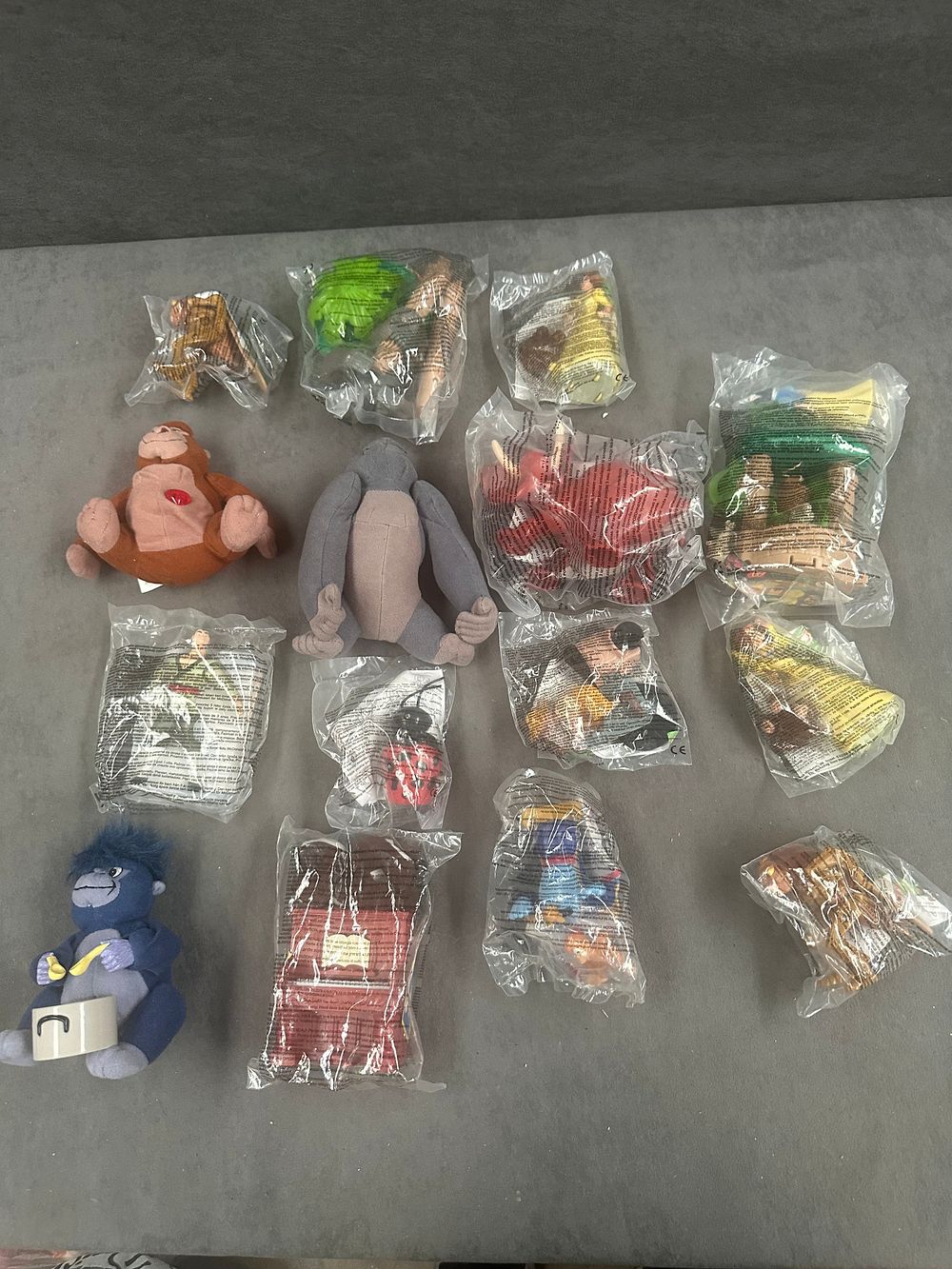 Lot 196: Fourteen Disney Tarzan McDonald's Happy Meal promotional toys