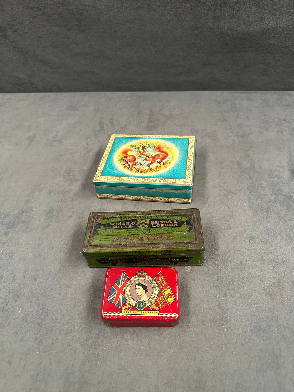 Lot 477: A Trio of Vintage Lithographed Metal Advertising and Commemorative Tins