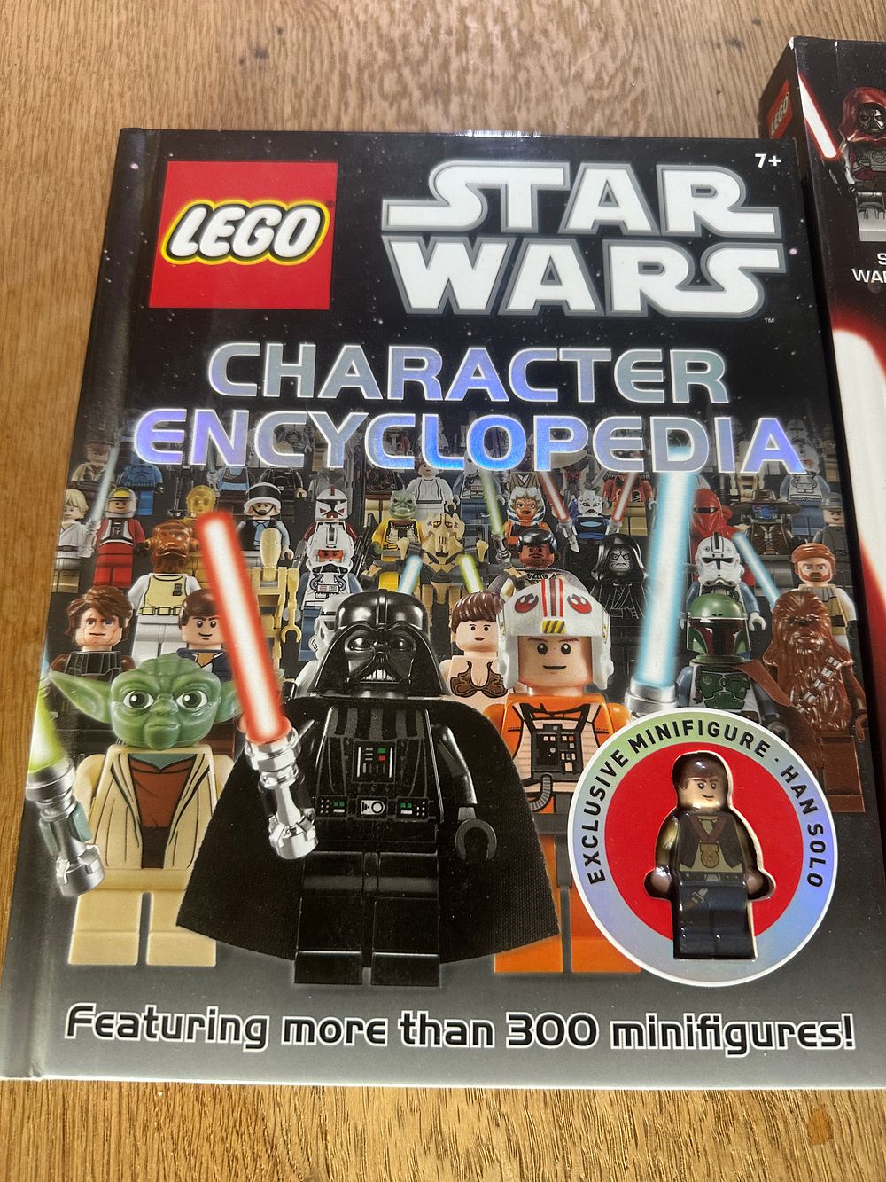 Lot 226: Dolan, Hannah and Lipkowitz, Daniel. Two Volumes: LEGO Star Wars Character Encyclopedia and The Dark Side. DK, 2011-2014. First Editions.