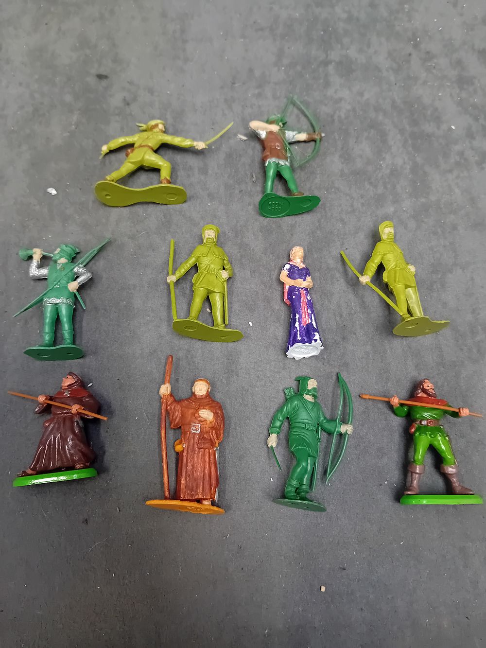 Lot 240: A Collection of 10 Vintage Robin Hood Toy Figures