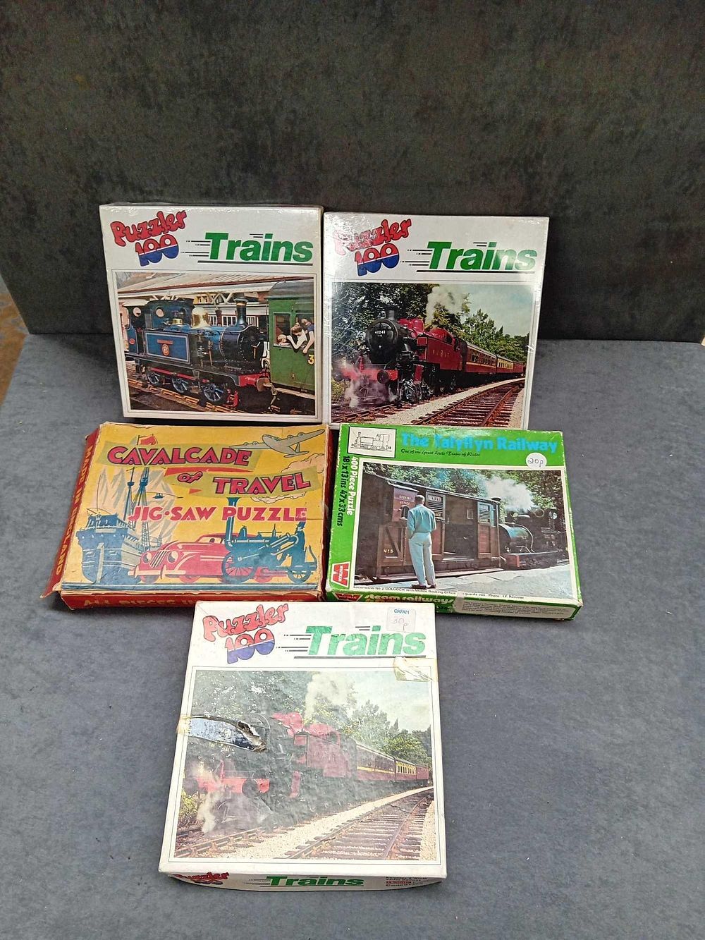 Lot 287: 5 x transport themed puzzles 4 x trains...