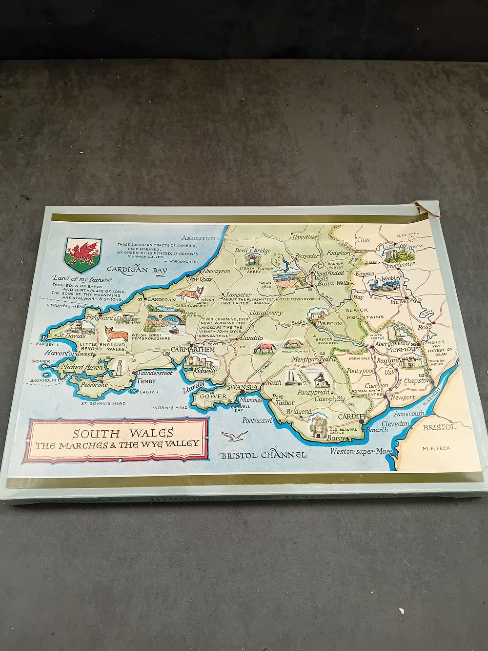 Lot 491: A Vintage Cardboard Jigsaw Puzzle, 'South Wales The Marches & The Wye Valley, ' by M.F. Peck