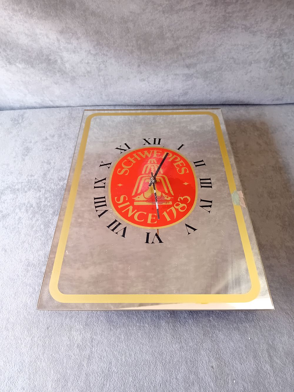 Lot 495: SCHWEPPES ADVERTISING MIRRORED WALL CLOCK WITH QUARTZ MOVEMENT