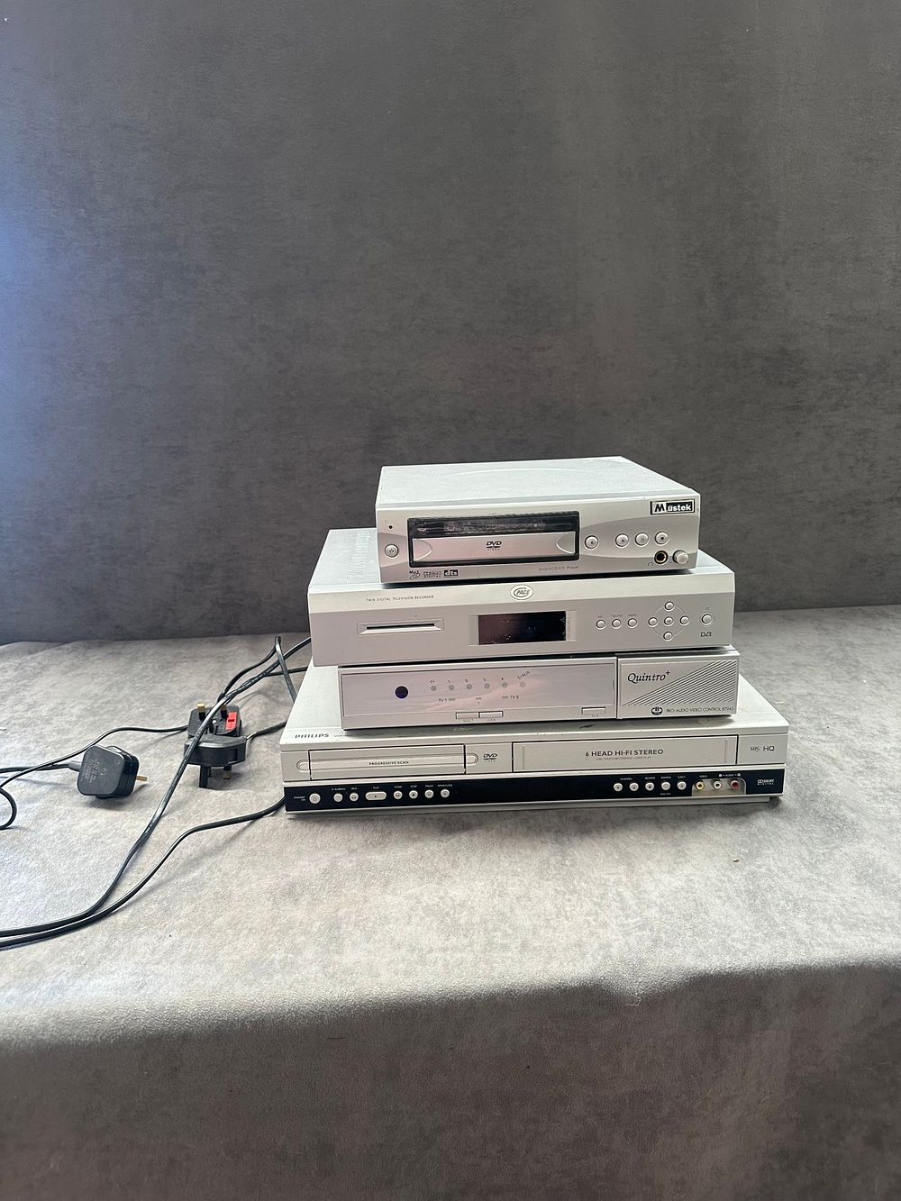 Lot 661: A Collection of Home Audio Visual Equipment Including Philips DVD VCR Combo and Mustek DVD Player