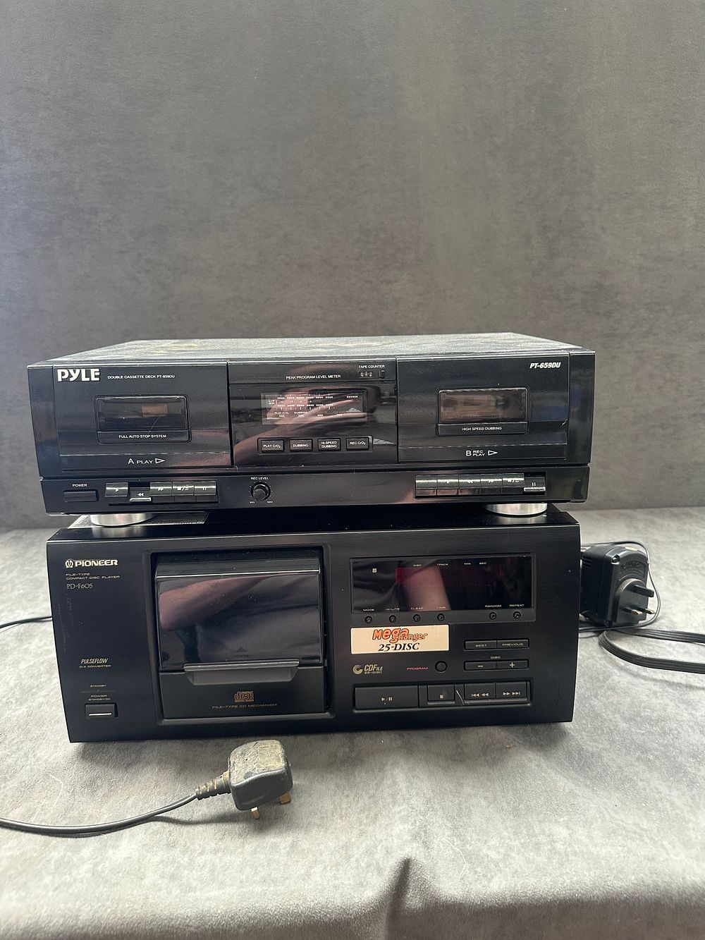 Lot 662: Two Hi-Fi Audio Components comprising a Pioneer PD-F605 25-Disc Compact Disc Player and a Pyle PT-659DU Double Cassette Deck