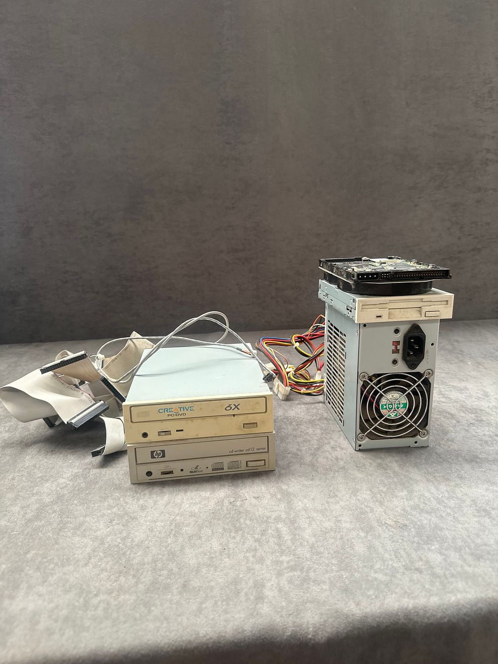 Lot 676: An Assortment of Vintage Internal Computer Components and Peripherals including Sparkle Power Supply and Drives