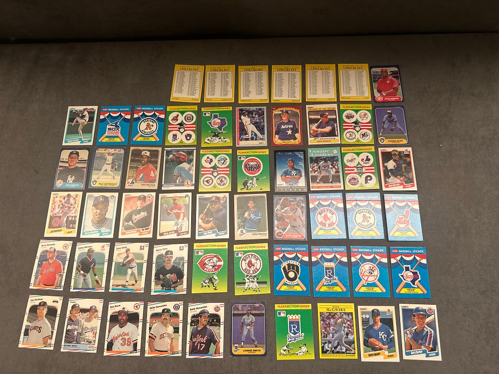 Lot 40: A Collection of Fleer Baseball Trading Cards and Stickers from the 1990 and 1991 Seasons