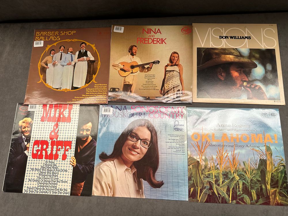 Lot 46: A Collection of Six Assorted Vinyl LP Records Featuring Folk, Country, and Vocal Pop Artists