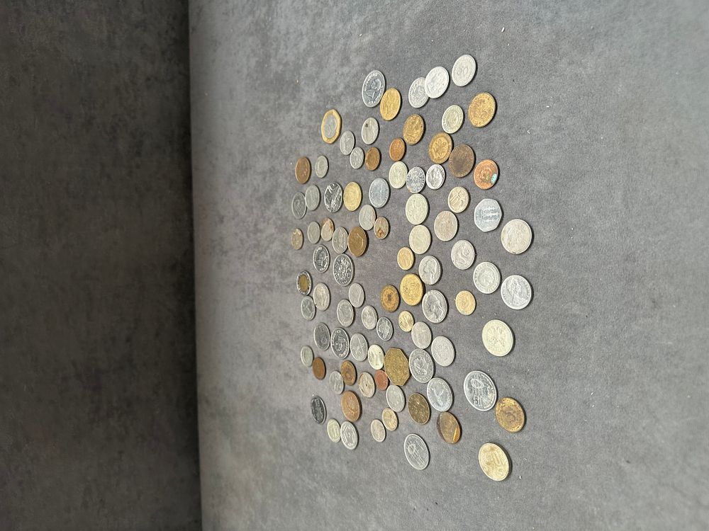 Lot 389: A Collection of World Coins and Tokens including UK, TR, and NL Issues