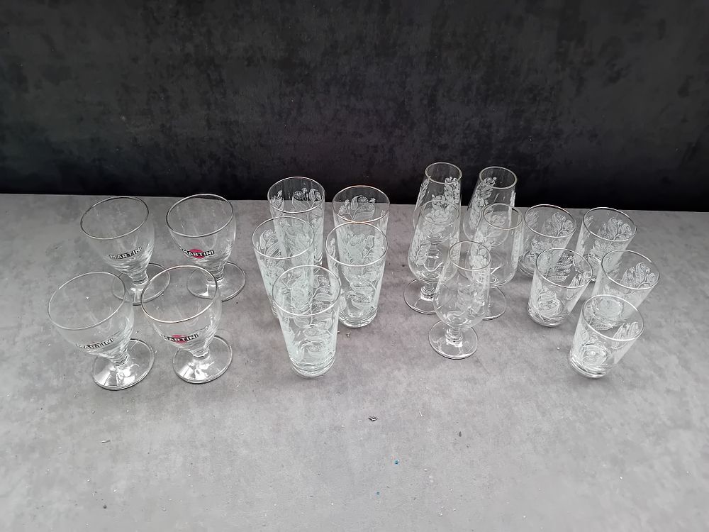 Lot 716: A Collection of 20 Tiffin Etched Crystal and Branded Martini Barware Glasses