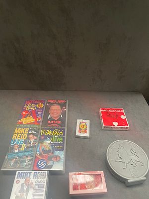 Various items containing 5 vhs of Mike Reid Mike reid some of the is case only, 1 pack of cards 