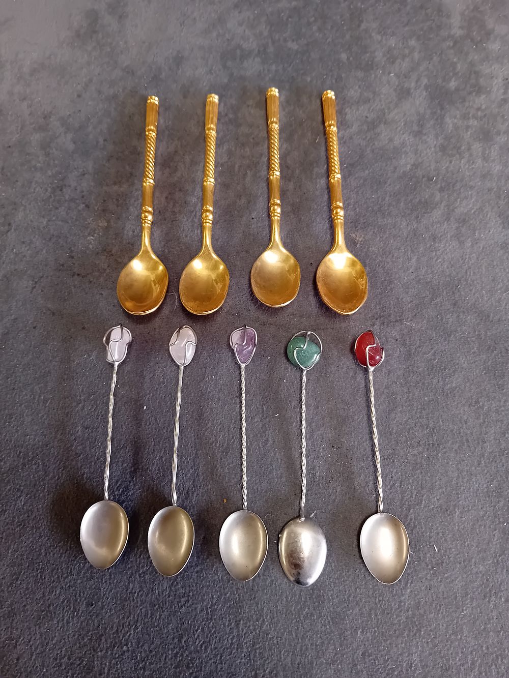 Lot 545: A Collection of Gold-Tone and Silver-Tone Demitasse Spoons with Stone Finials
