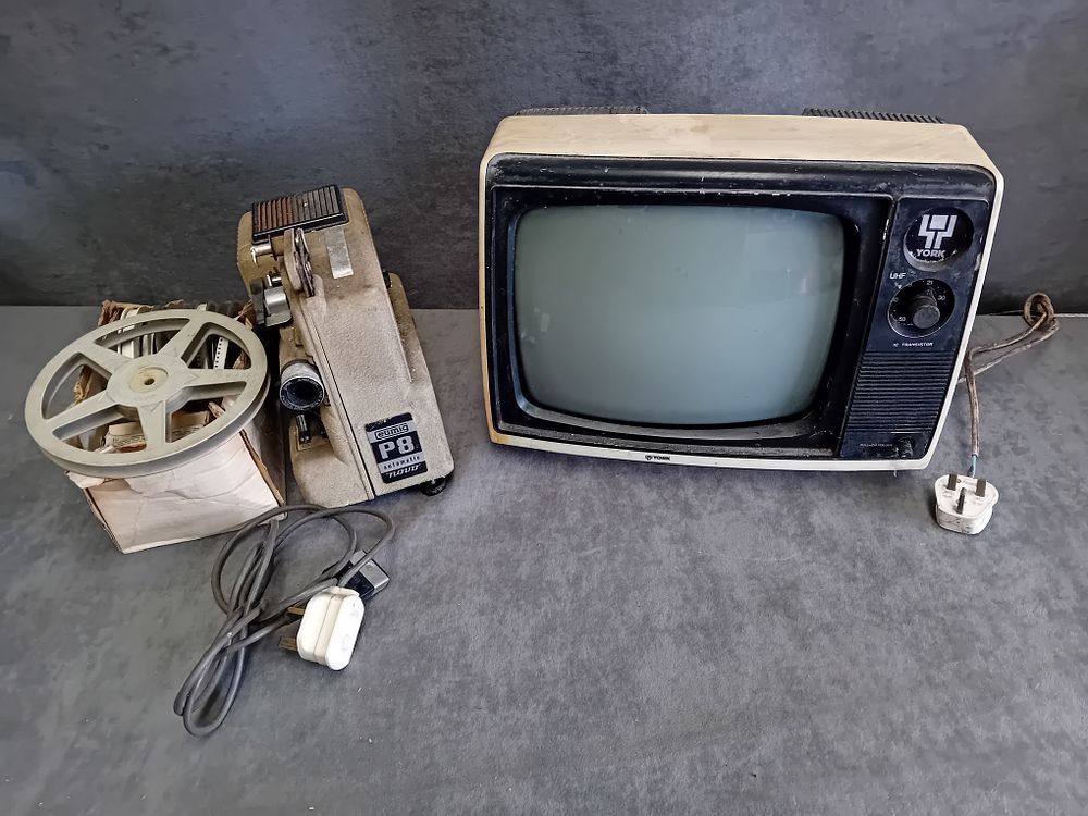 Lot 548: Two Vintage Electronics: York RP-206F Portable Television and Eumig P8 Automatic Novo Projector