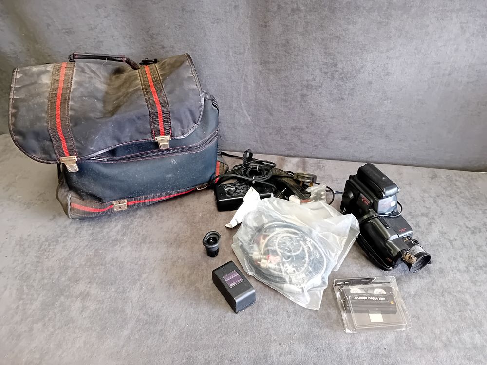 Lot 549: Sanyo Vision 8 S1 8mm Camcorder Model VEM-S1P with Marlboro Gear Duffel Bag and Accessories