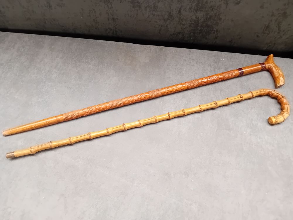 Lot 620: Lot of 2 Hand Carved Walking sticks as...