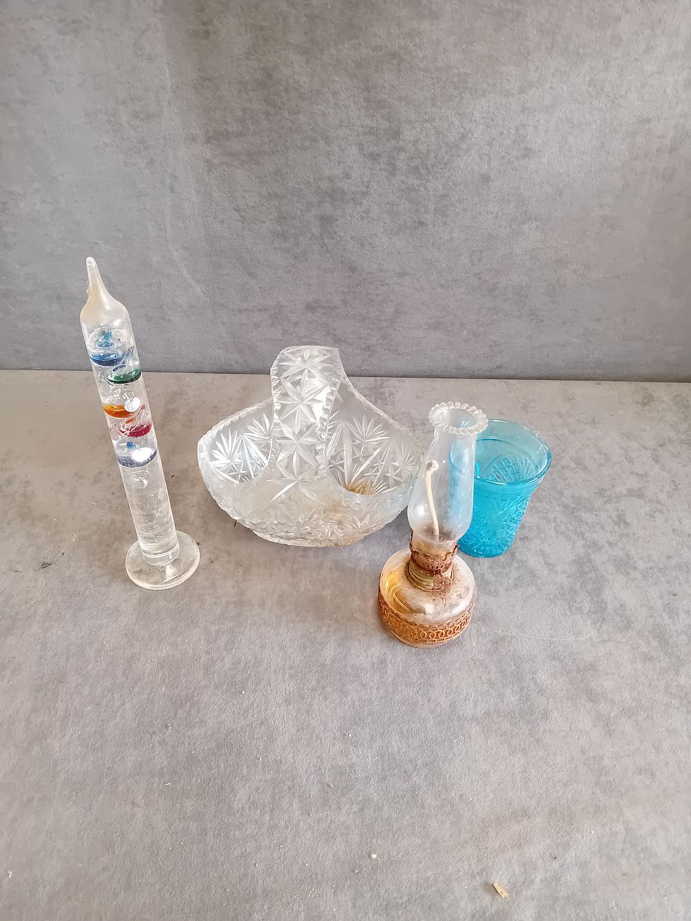 Lot 504: An Assortment of Decorative Glassware Including a Galileo Thermometer and Miniature Oil Lamp
