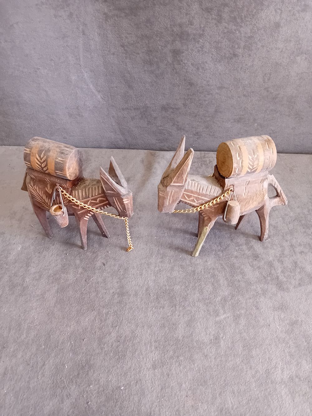 Lot 507: A Pair of Hand-Carved Wooden Folk Art Pack Donkey Figurines