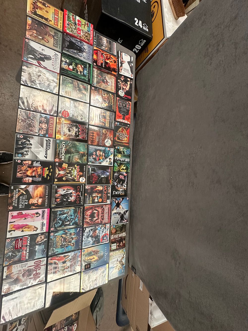 Lot 485: A Collection of approximately 75 assorted DVD movies and television series in Box 5