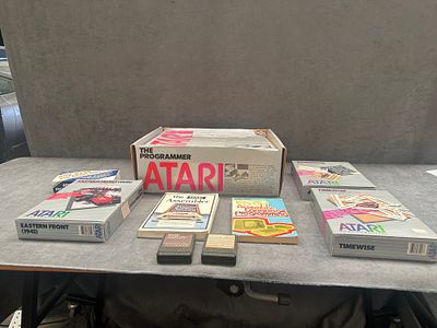 A Collection of Atari 400 Home Computing Equipment and Software Including The Atari Programmer Set. 