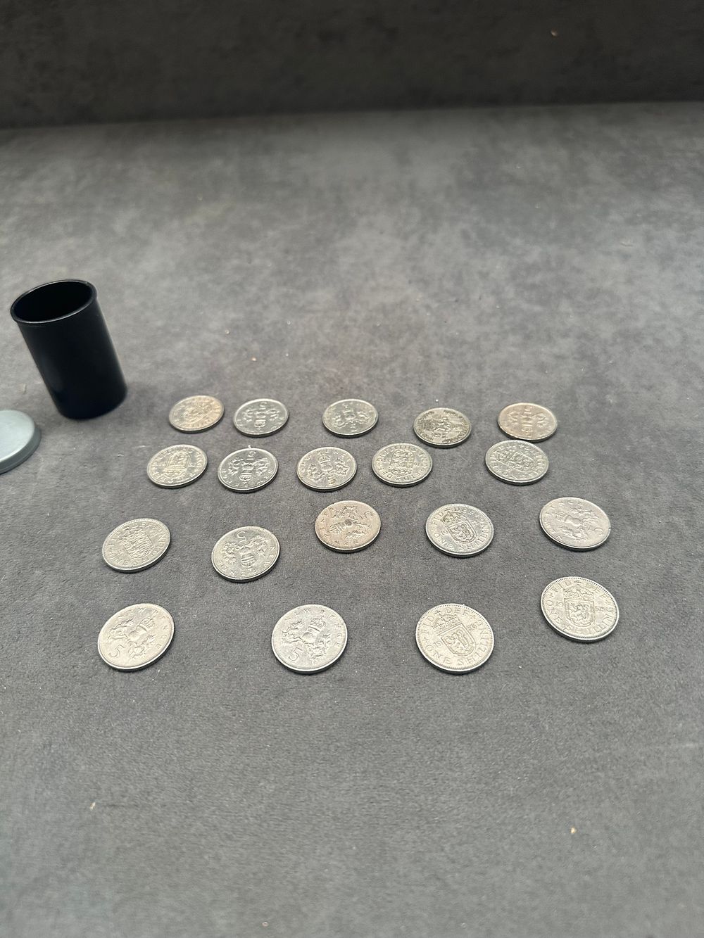 Lot 438: A Collection of UK Cupro-Nickel One Shilling and Five Pence Coins