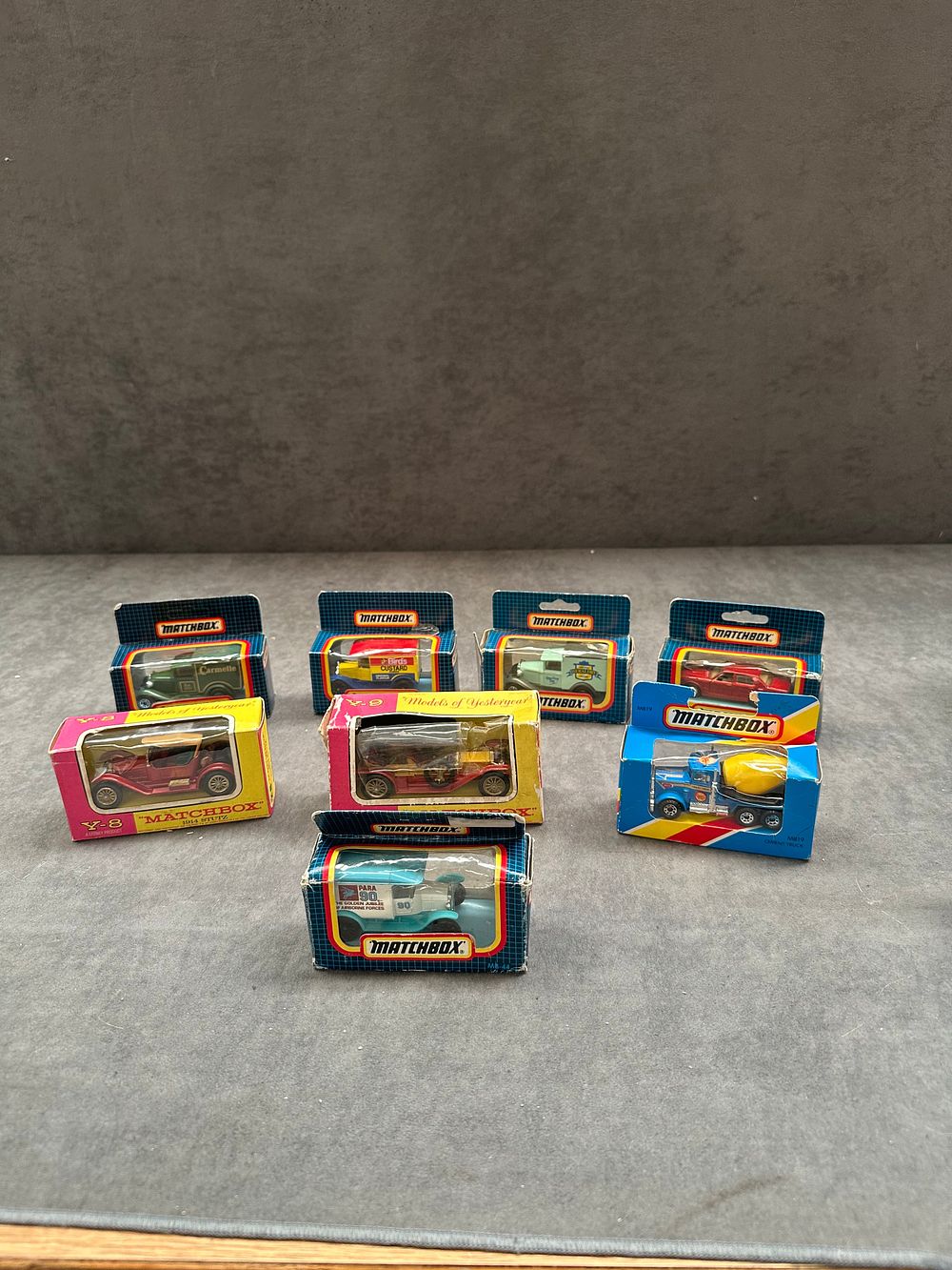 Lot 128: A Collection of Eight Matchbox Die-Cast Toy Vehicles in Original Packaging