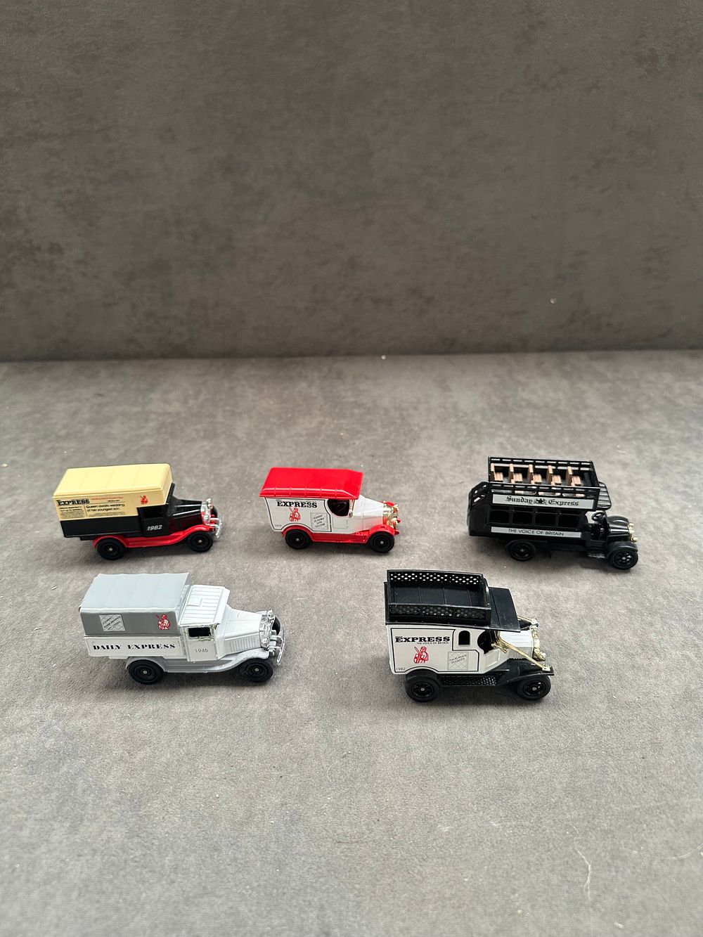 Lot 132: A Collection of Five Die-Cast Promotional Model Vehicles for The Daily Express and Sunday Express
