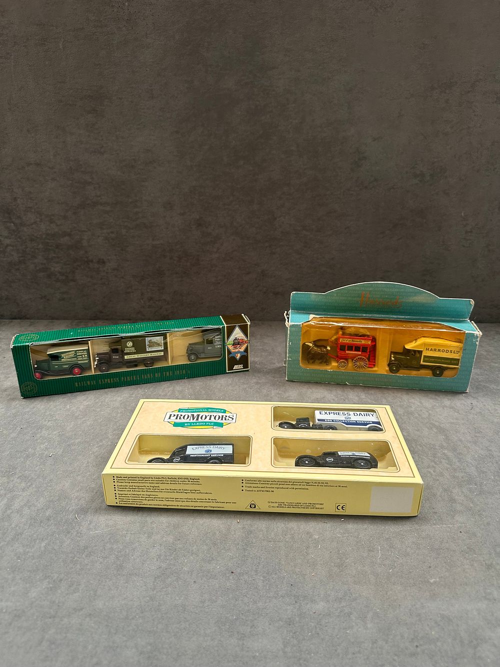 Lot 148: A Collection of Lledo and Harrods Boxed Die-Cast Model Vehicle Sets