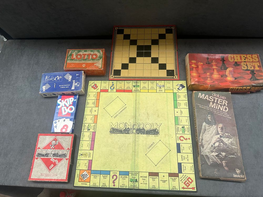 Lot 232: A Collection of Vintage British Board and Card Games including John Waddington Ltd Monopoly and Invicta Deluxe Mastermind