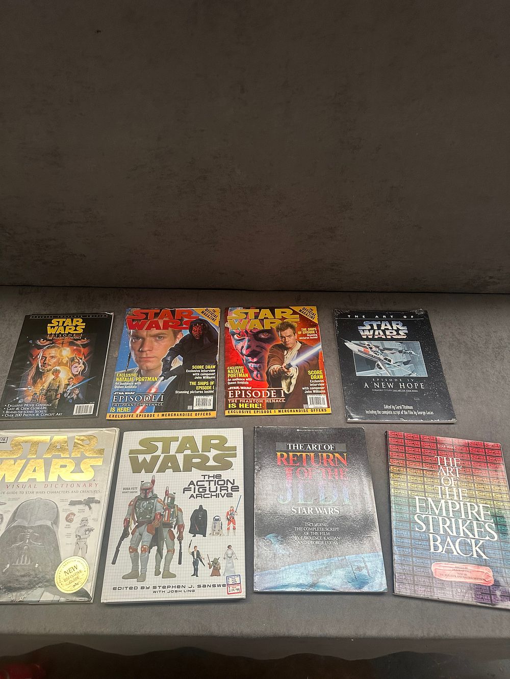 Lot 234: A Collection of Star Wars Art Books, Reference Guides and Official Episode I Magazines