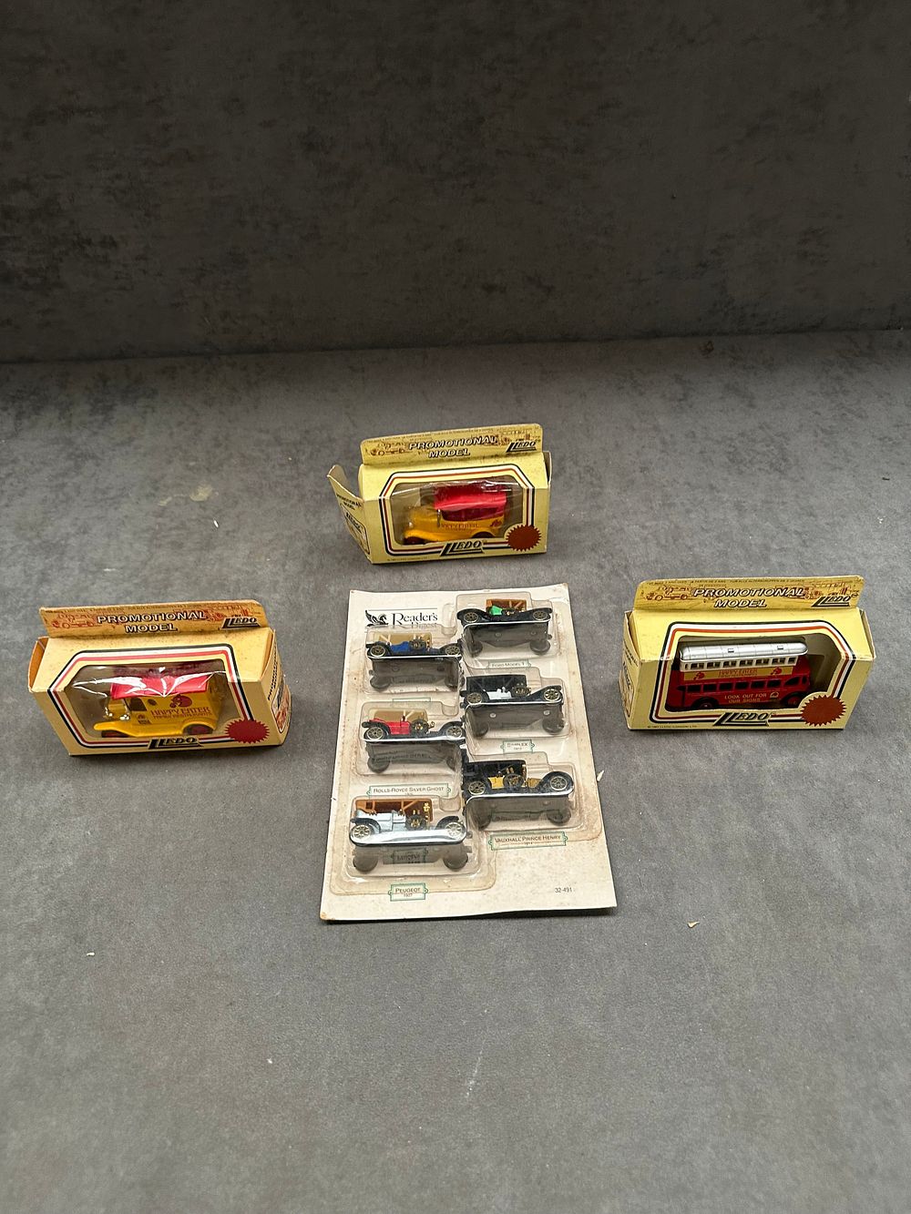 Lot 43: A Collection of Lledo Promotional Die-Cast Vehicles and a Reader's Digest Miniature Car Set