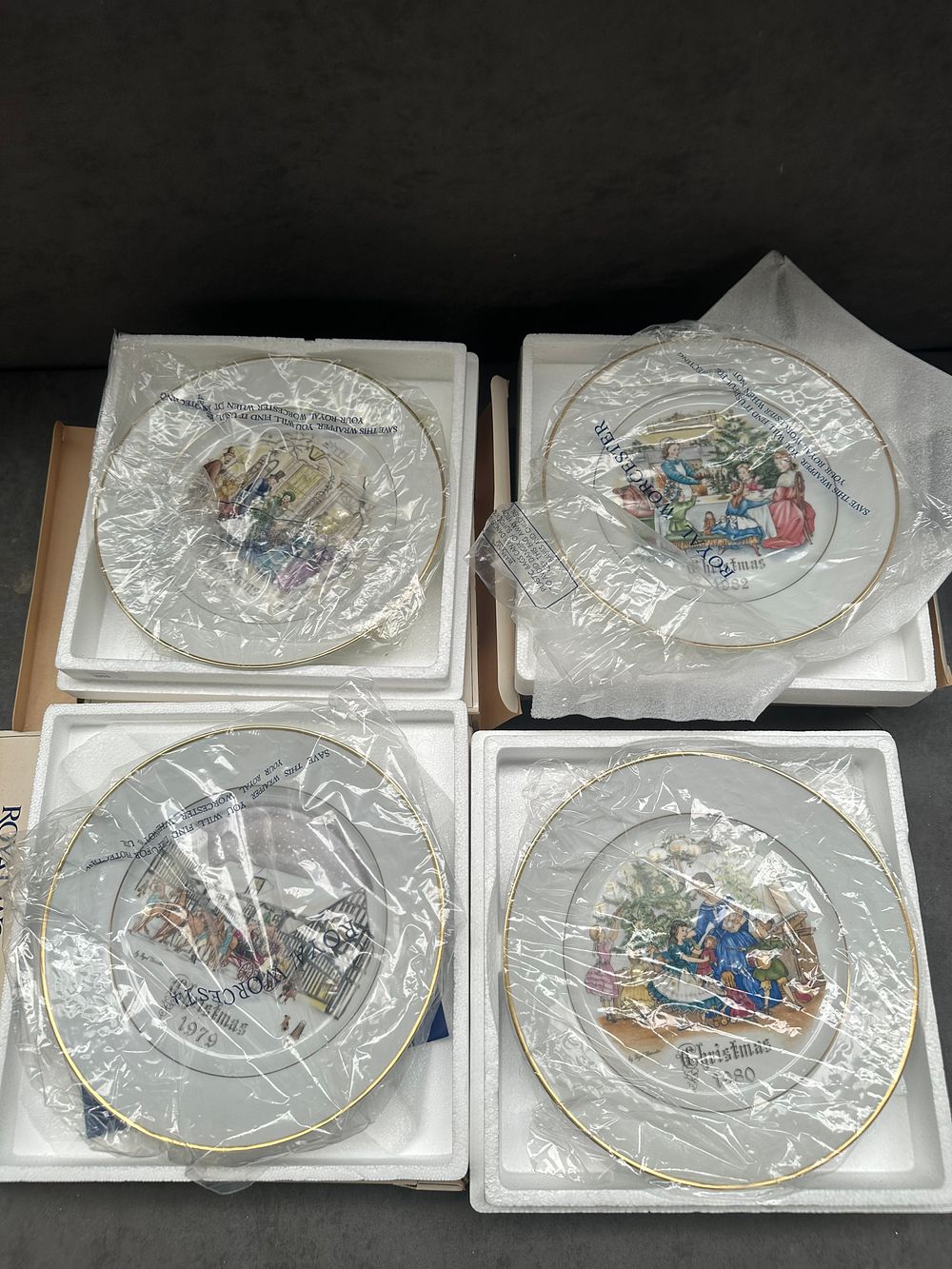 Lot 392: A Collection of Four Royal Worcester Christmas Plates 1979-1982