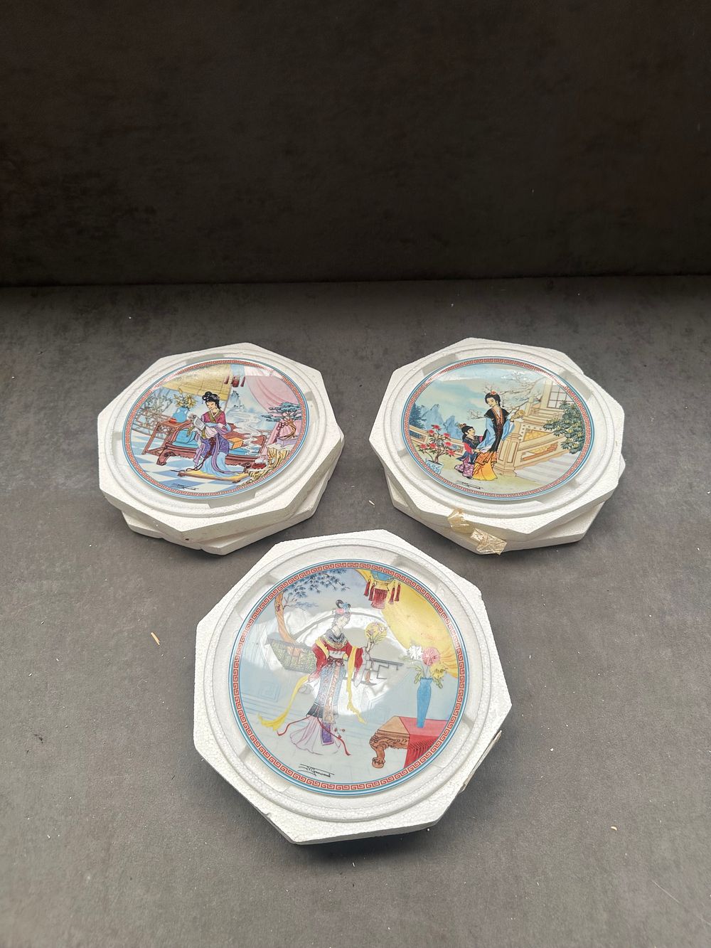 Lot 397: Three Chinese style porcelain collector plates signed H. C. Cheung