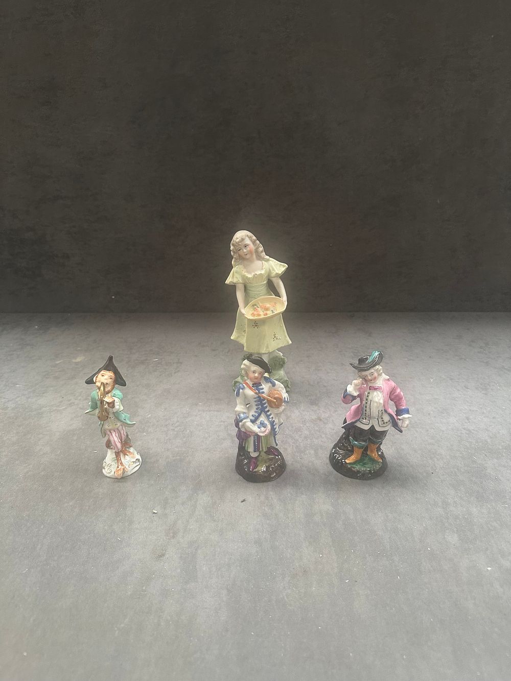 Lot 403: Three continental hand-painted porcelain figurines in 18th-century dress