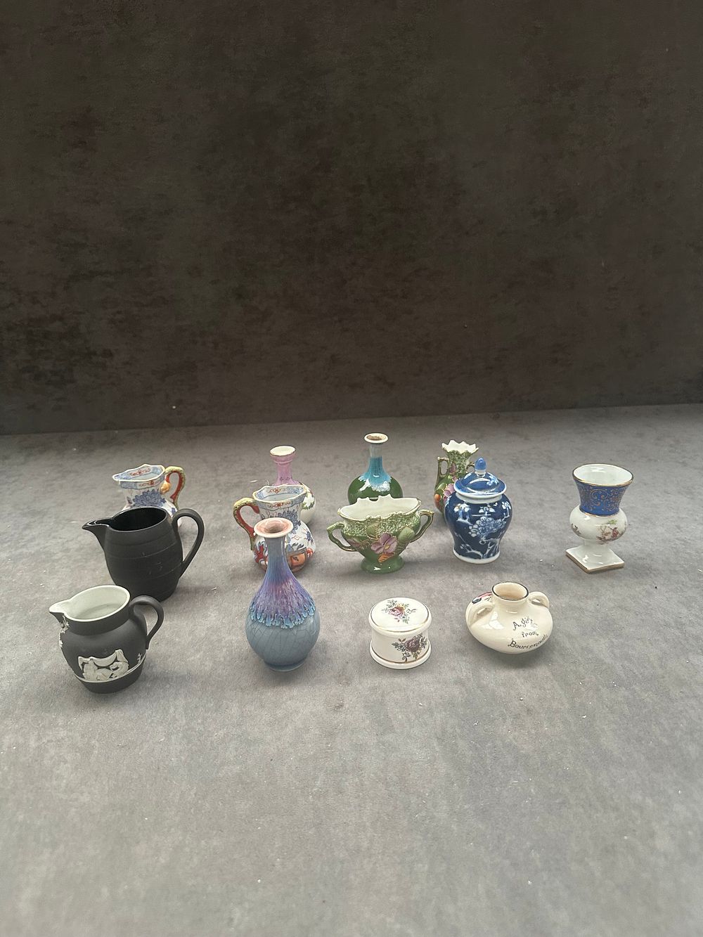 Lot 407: An Assortment of Miniature English Ceramics including Wedgwood and Mason's Ironstone