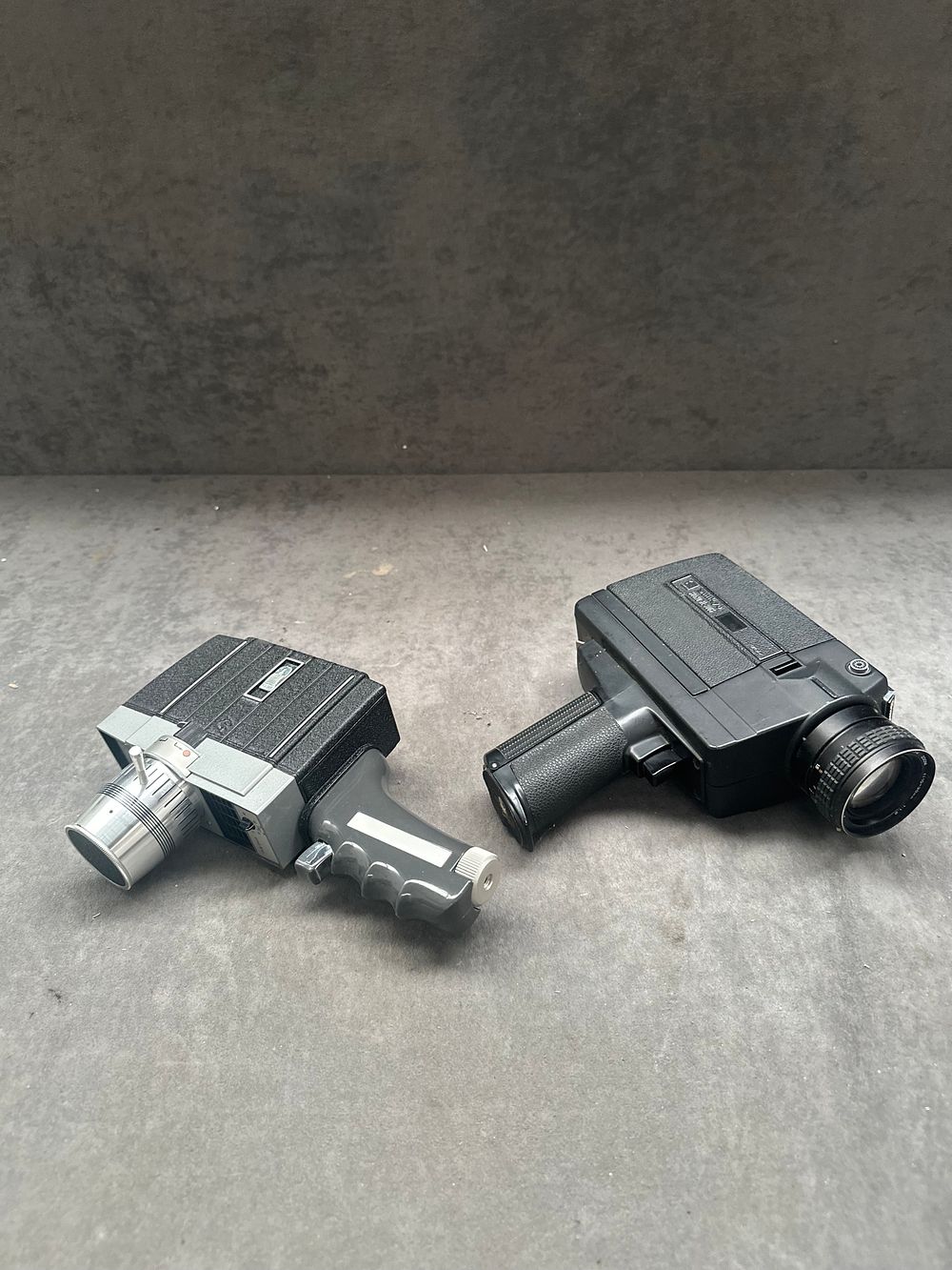 Lot 355: Two Vintage Movie Cameras Comprising a Sankyo Sound XL-300S Super 8 and a Bell & Howell 8mm