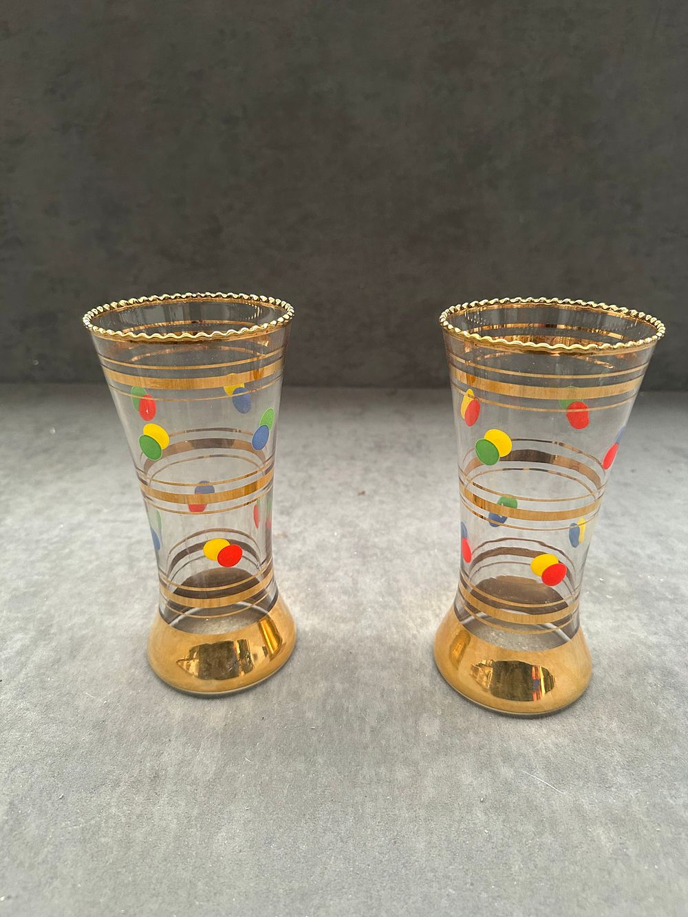 Lot 413: A Pair of Mid-Century Modern Gilt and Polychrome Enamel Glass Vessels