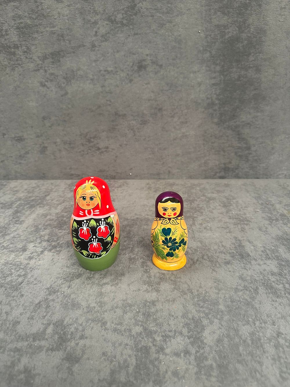 Lot 241: Two Sets of Russian Nesting Dolls