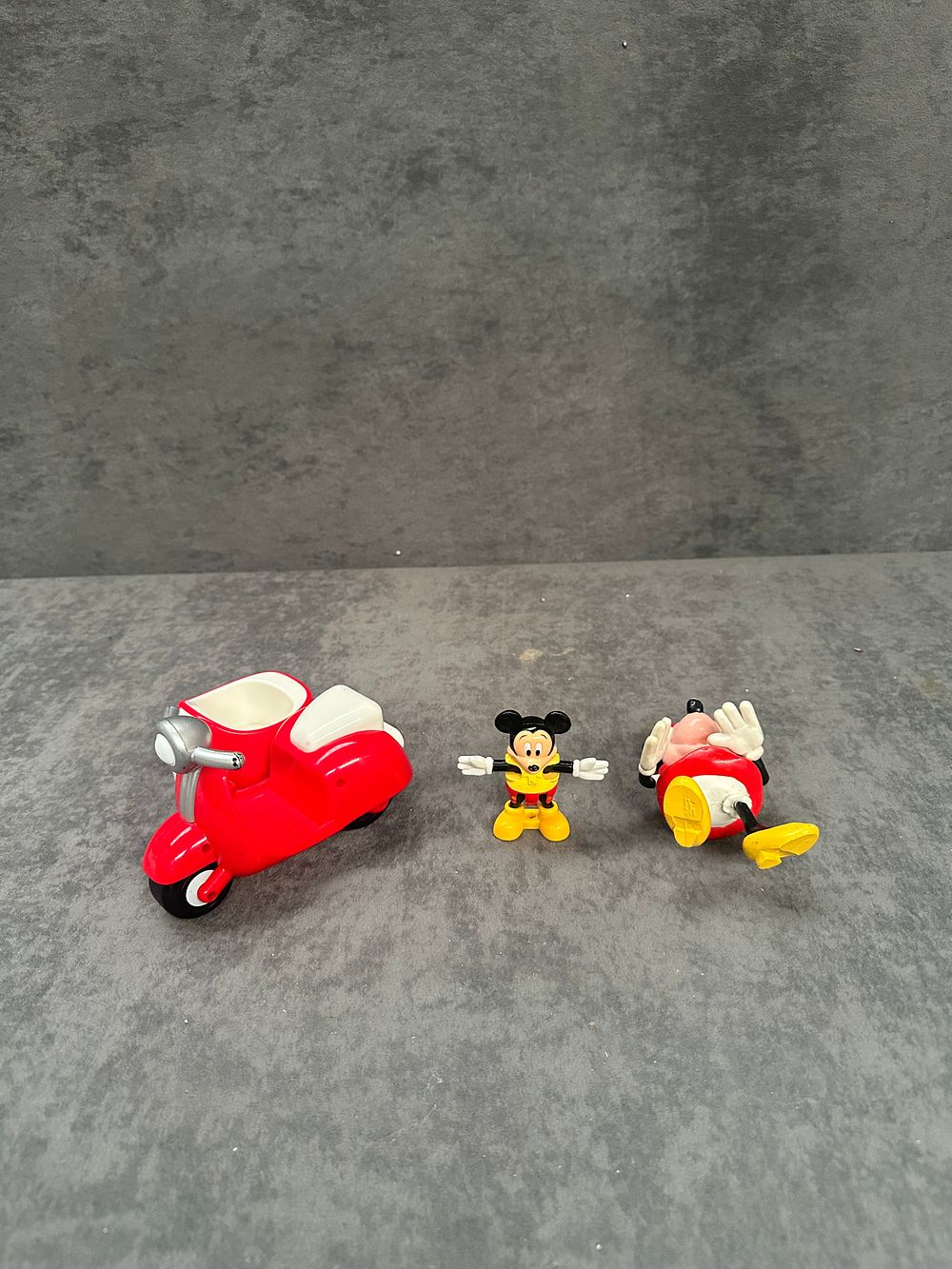 Lot 242: Three Disney Mickey and Minnie Mouse Figures with Red Scooter and Sidecar