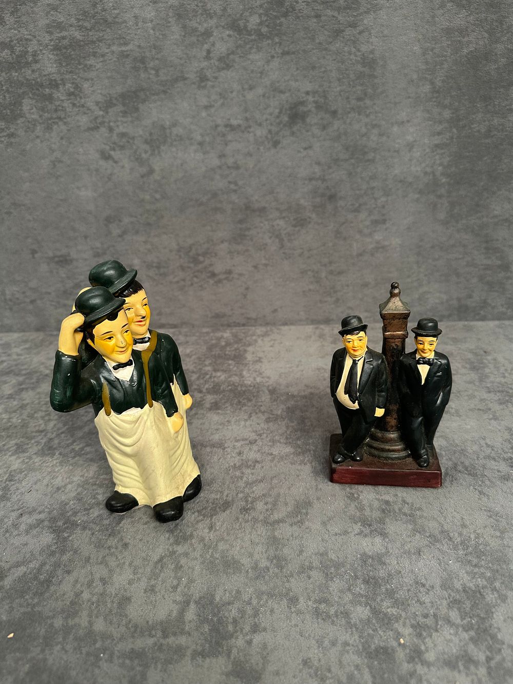 Lot 414: Two Laurel and Hardy Hand-Painted Figurines