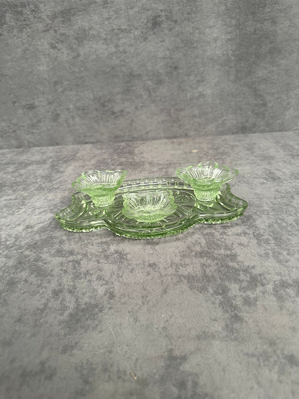 Lot 420: A Trio of Green Pressed Glass Trinket Pots and a Matching Tray