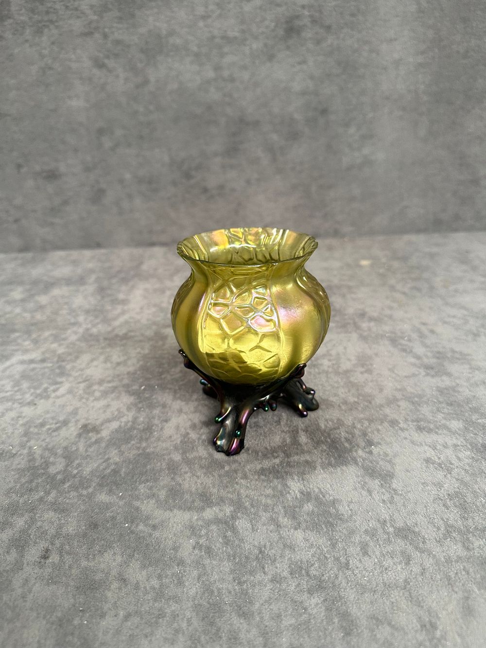Lot 3: An Art Nouveau Iridescent Glass Footed Thistle Vase