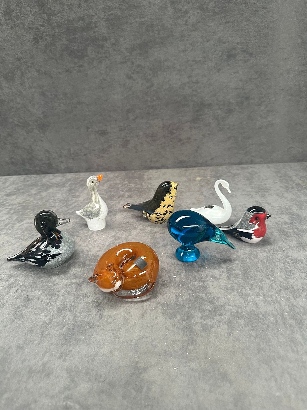 Lot 438: A collection of miniature hand blown glass animal figurines