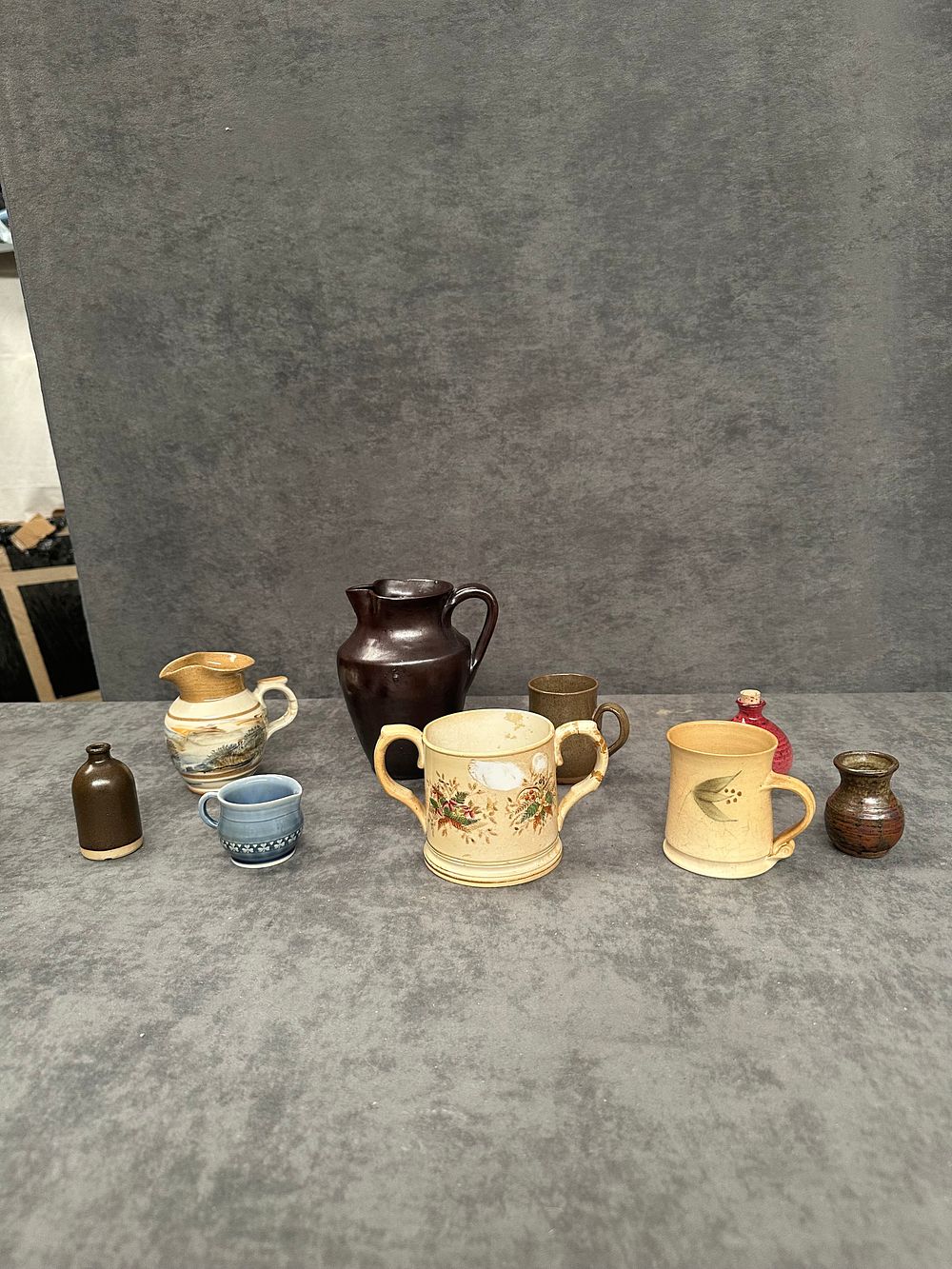 Lot 449: An Assortment of Seven Miniature and Small-Scale Ceramic Vessels