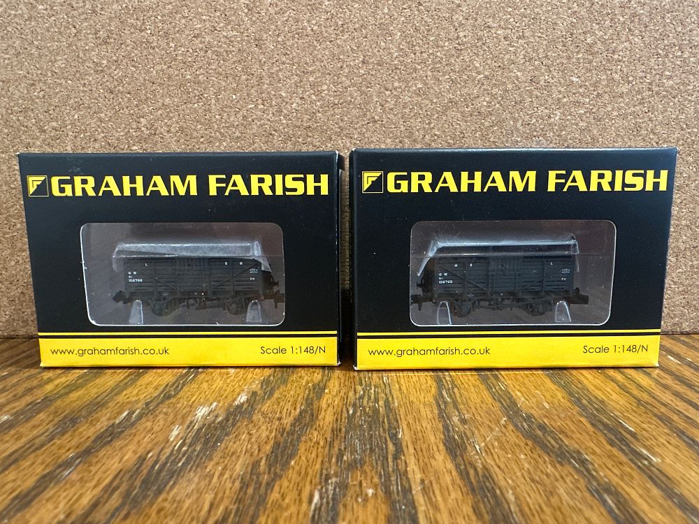 Lot 180: A Pair of Graham Farish N Gauge GWR Dark Grey Cattle Wagons in Original Boxes