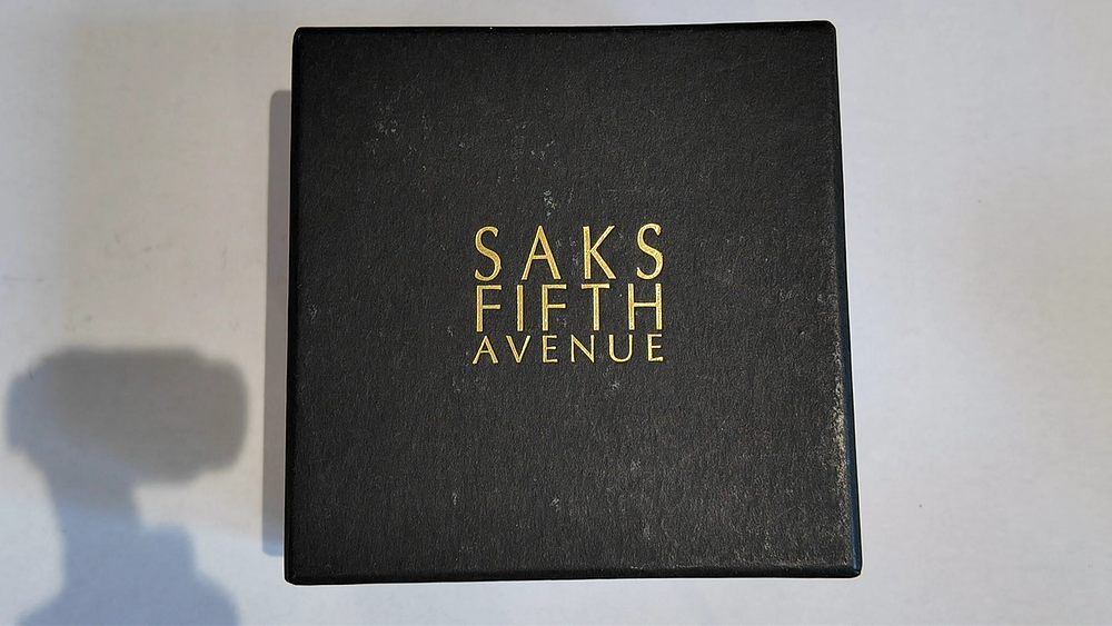 Lot 4: A Saks Fifth Avenue Gold-Toned Compact Mirror with Presentation Box and Pouch