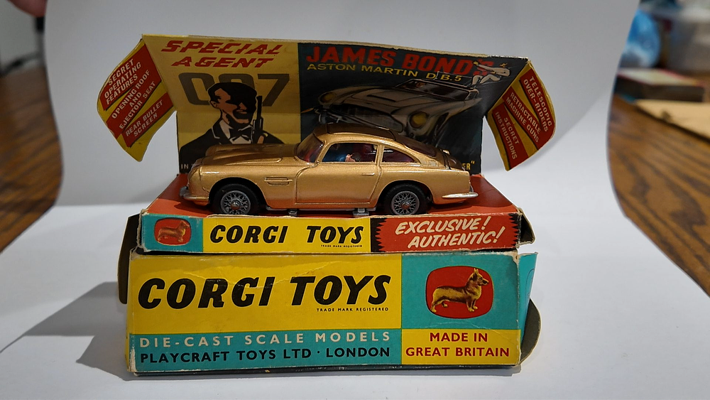 Lot 41: Corgi Toys 261 James Bond's Aston Martin DB5 Gold Die-Cast Model with Original Box